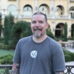 WebDevStudios Client Strategist John Hawkins wearing a WordPress T-shirt